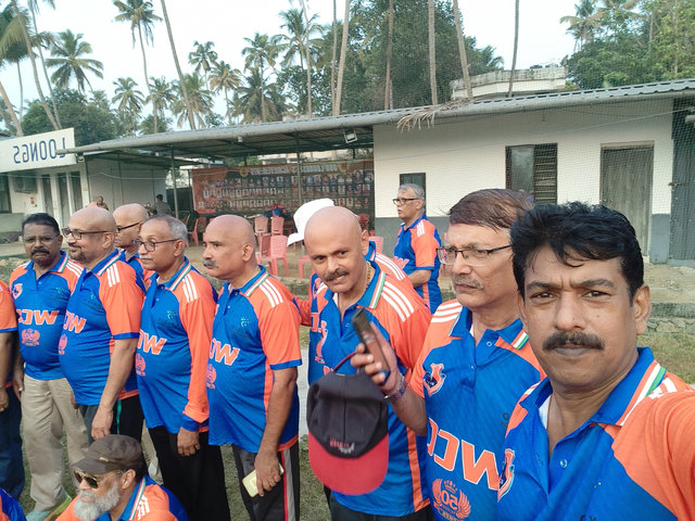 WCC members in team colours at cricket venue